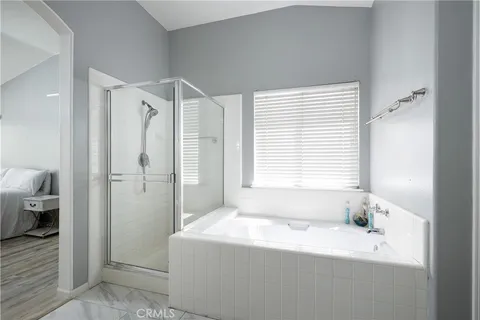 a bathroom with a bathtub and a sink