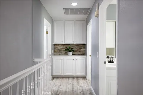 a view of kitchen with wooden floor