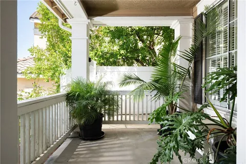 a view of a garden with potted plants