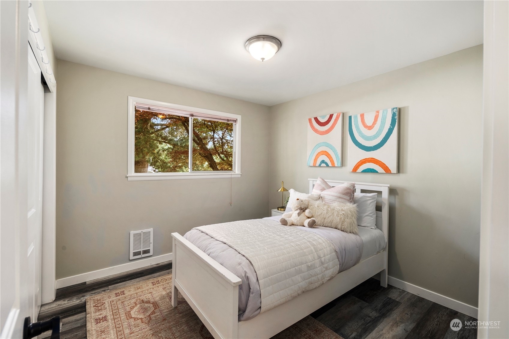 19404 4th Drive Southeast Bothell, WA 98012 - Photo 23 of 33 a bedroom with a bed and a window with painting on the wall