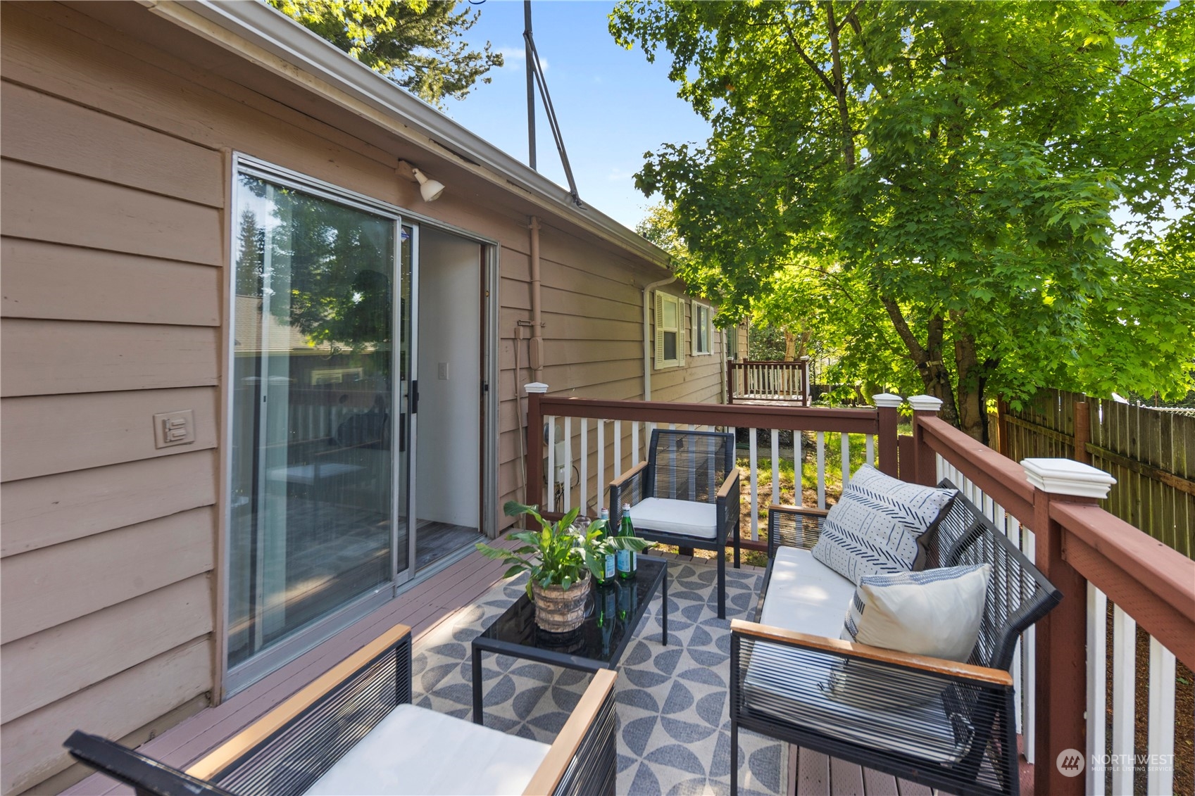 19404 4th Drive Southeast Bothell, WA 98012 - Photo 27 of 33 a view of a chair and table in the balcony