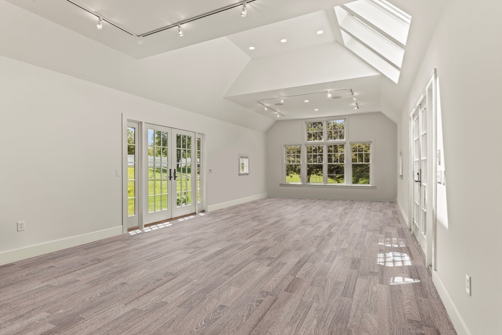 785 Old Harbor Road Chatham, MA 02650 - Photo 14 of 40 wooden floor in an empty room with a window