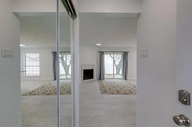 a view of front door of house and stairs