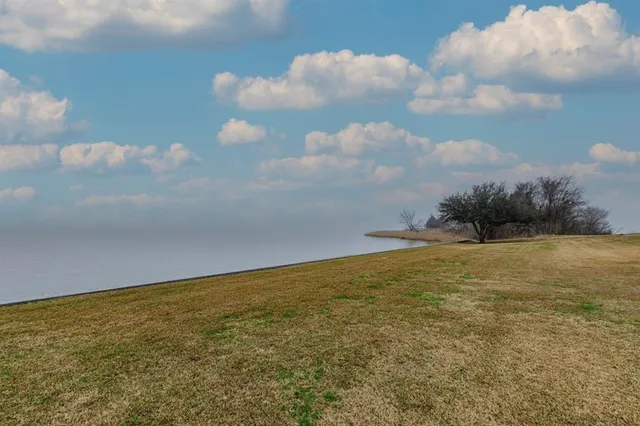 a view of an ocean with a yard