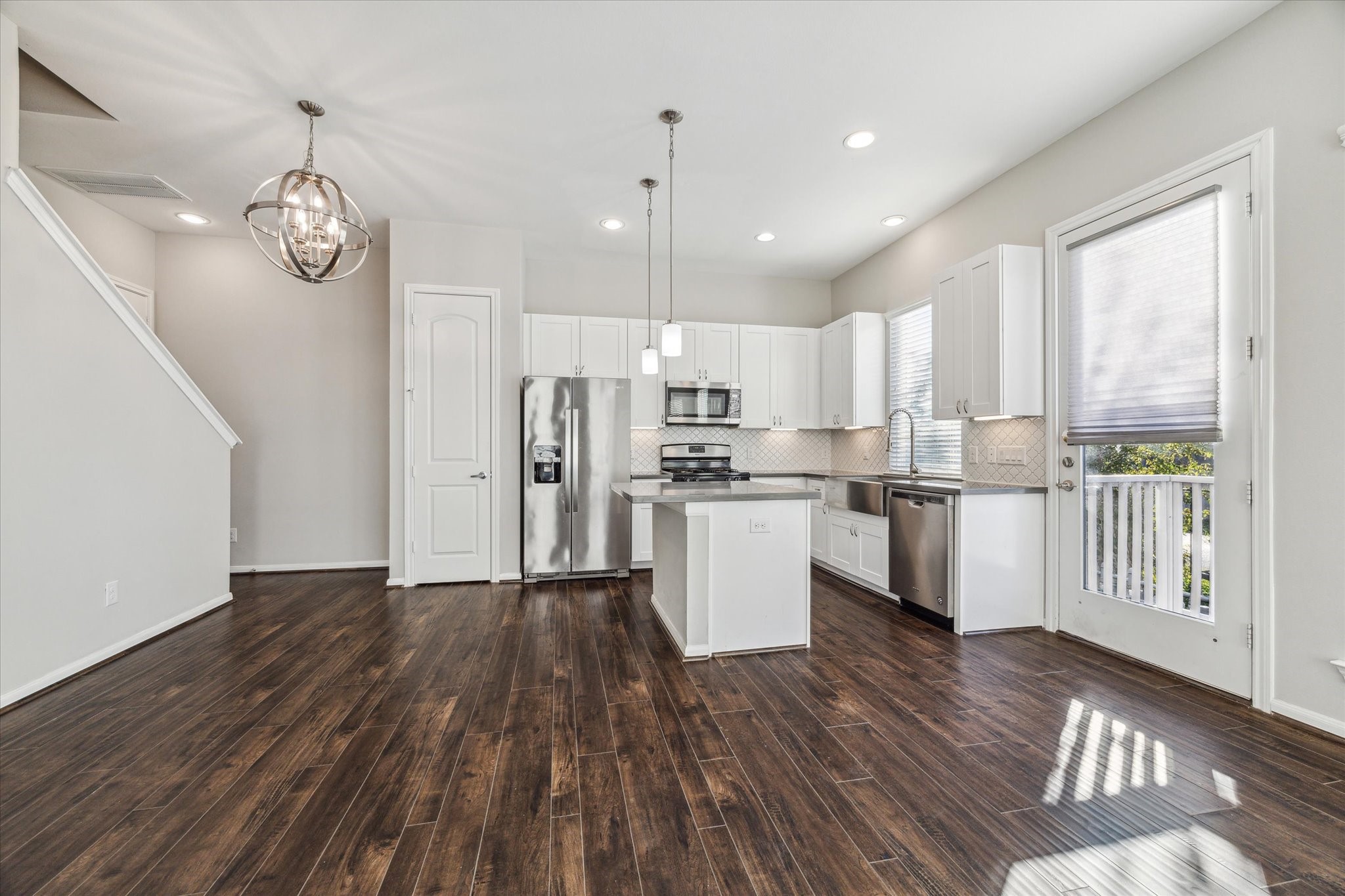 5610 Patrick Street, Unit A Houston, TX 77076 - Photo 2 of 11 a view of a kitchen with wooden floor and a window
