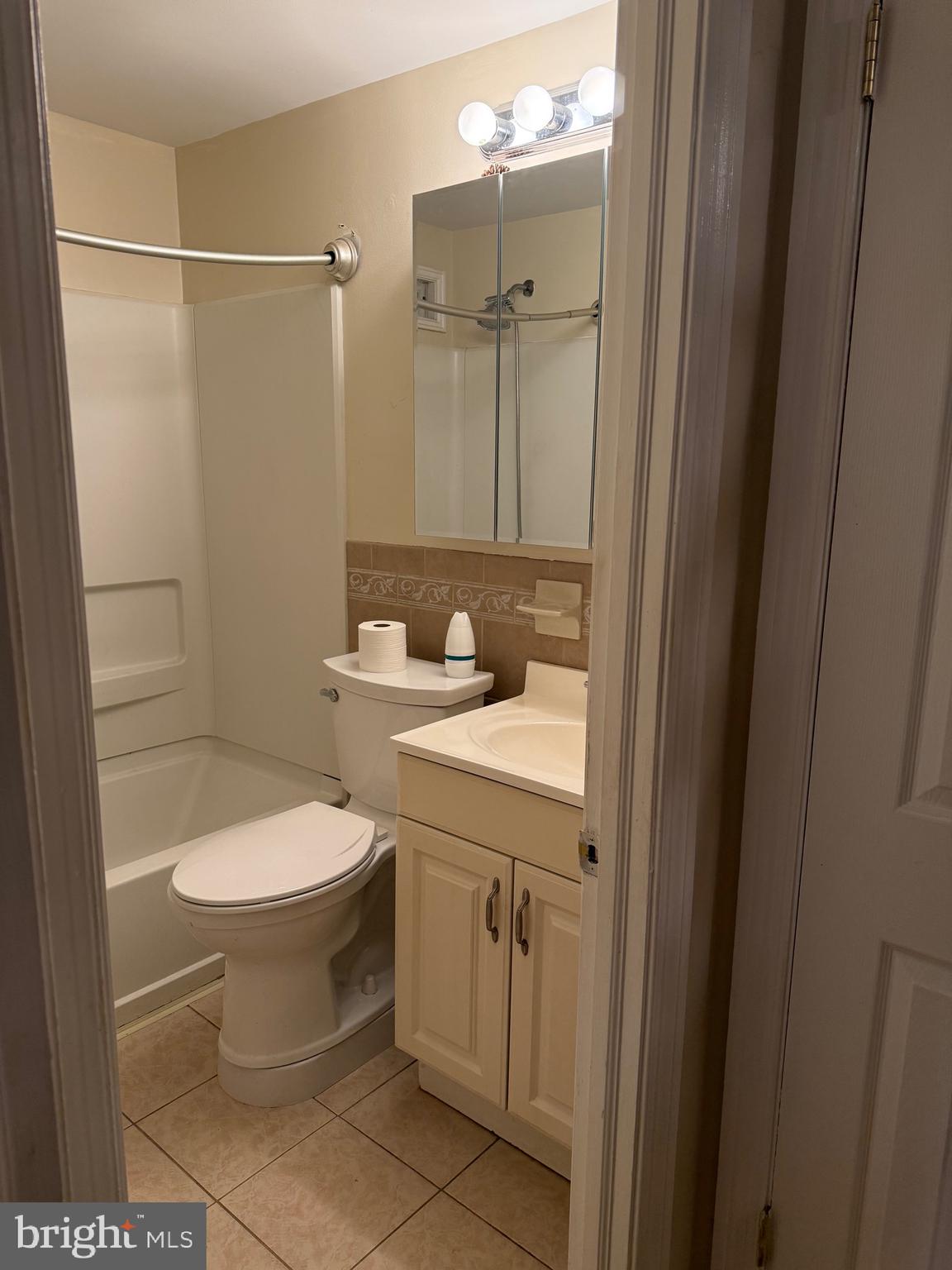 250 East Avon Road Brookhaven, PA 19015 - Photo 25 of 61 a bathroom with a sink a toilet and shower