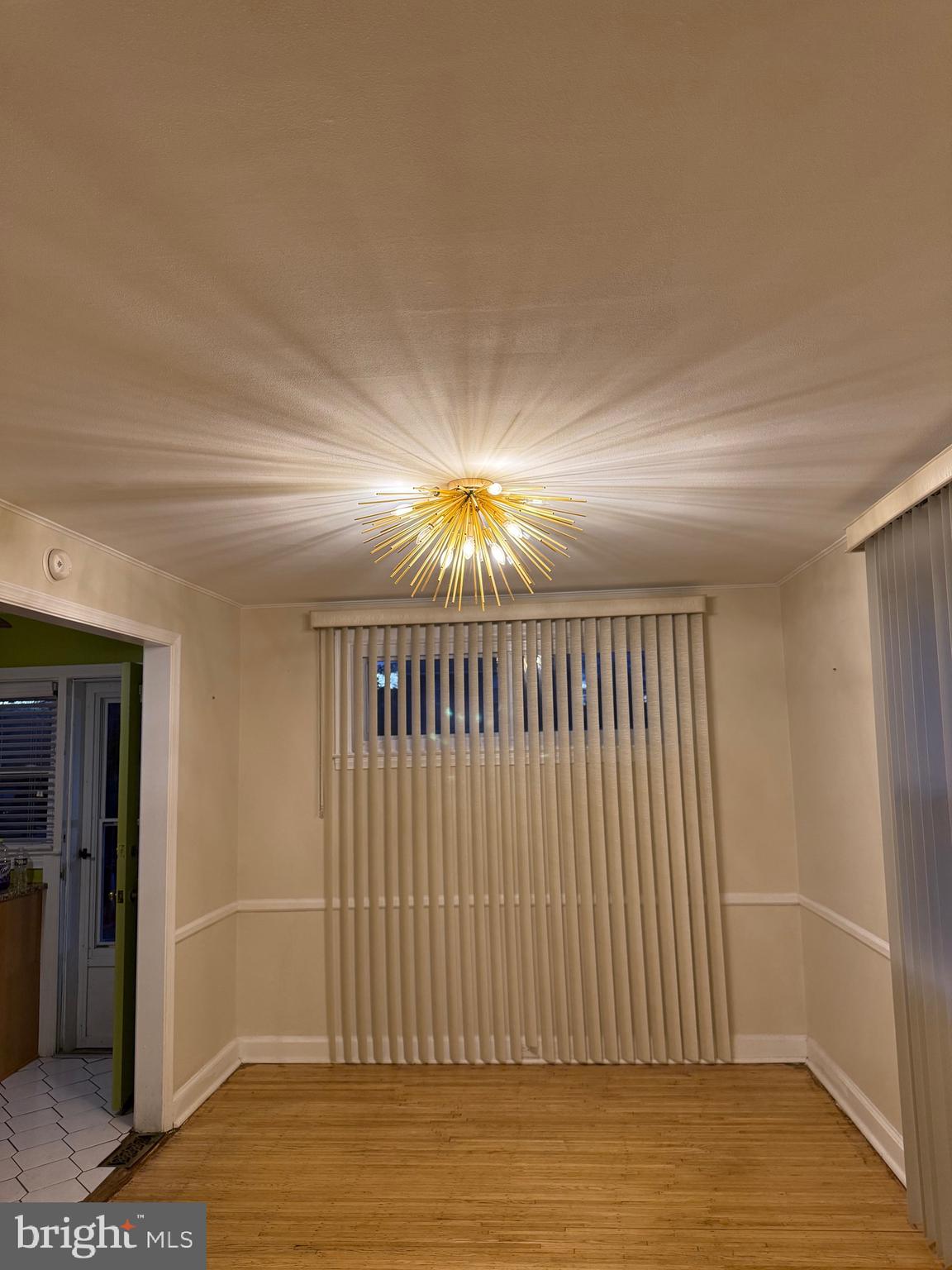 250 East Avon Road Brookhaven, PA 19015 - Photo 35 of 61 a view of entryway wooden floor and chandelier
