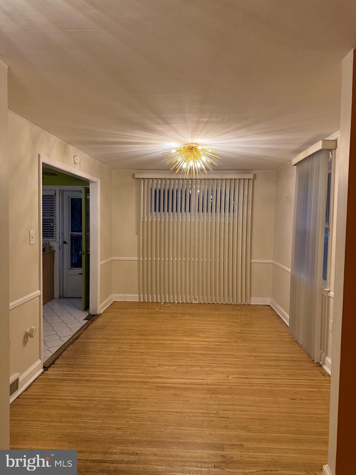 250 East Avon Road Brookhaven, PA 19015 - Photo 36 of 61 a view of an empty room with wooden floor