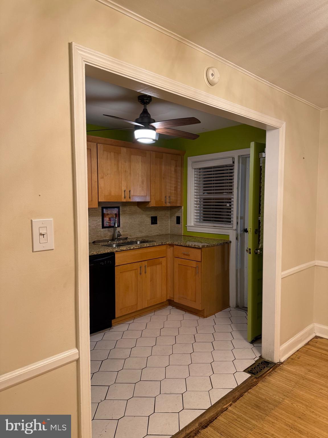 250 East Avon Road Brookhaven, PA 19015 - Photo 42 of 61 a kitchen with a refrigerator and a stove