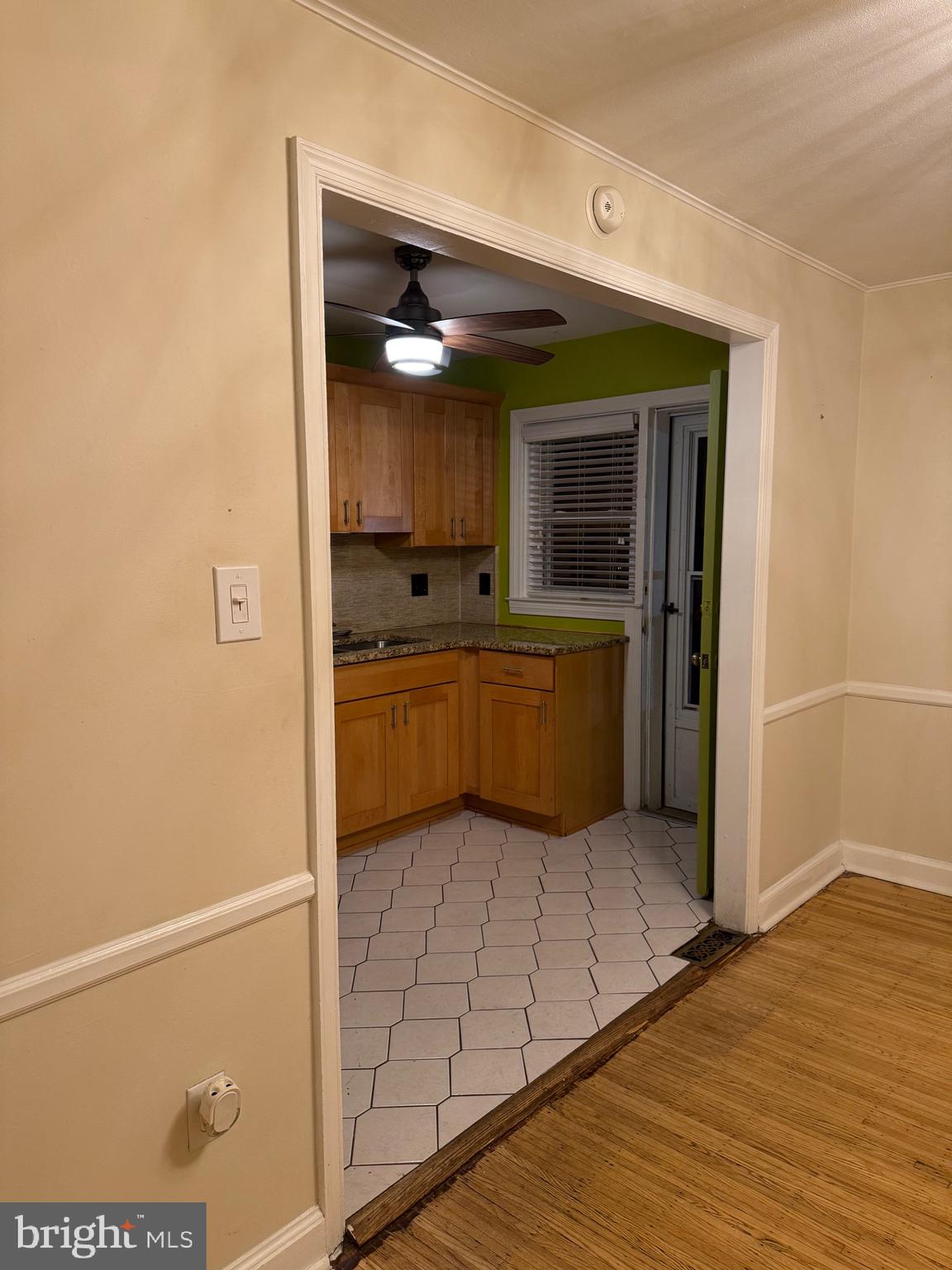 250 East Avon Road Brookhaven, PA 19015 - Photo 53 of 61 a view of kitchen with wooden floor and window