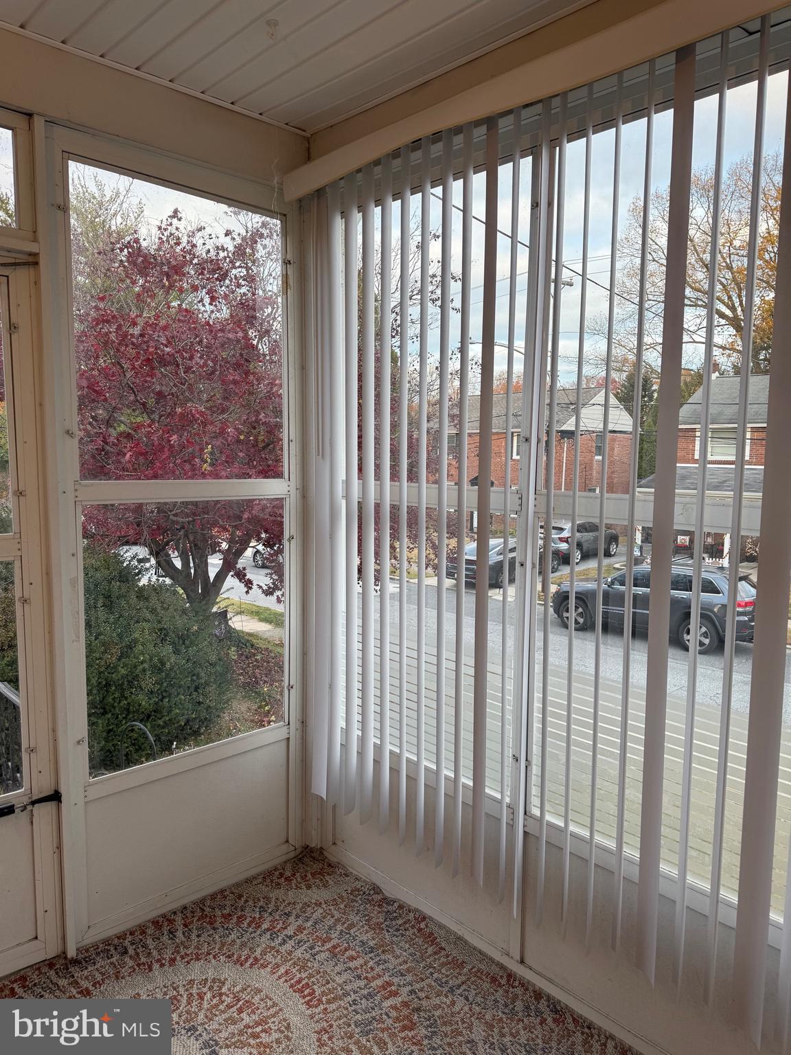 250 East Avon Road Brookhaven, PA 19015 - Photo 9 of 61 a view of a porch with a floor to ceiling window