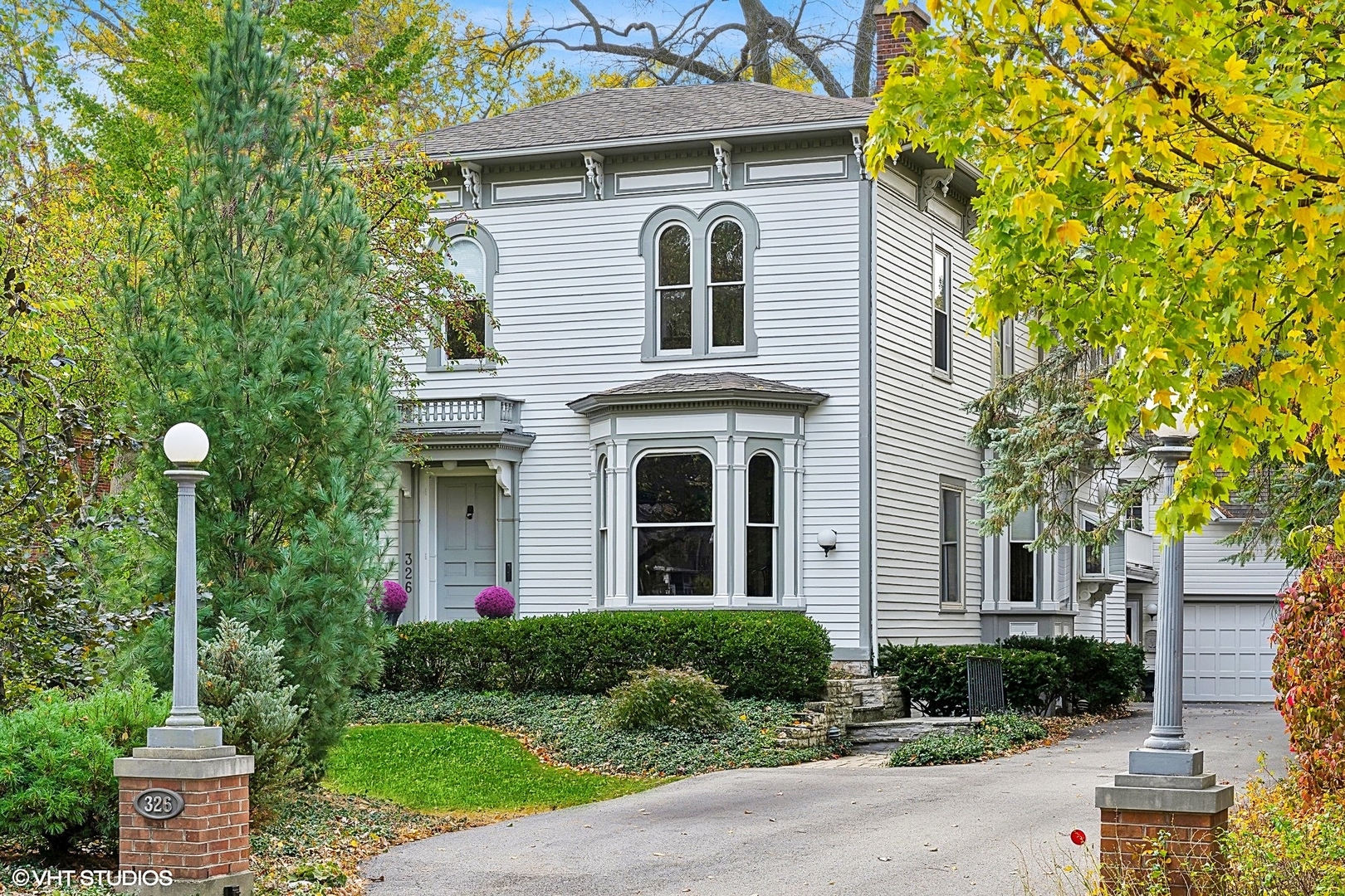 326 Ridge Avenue Winnetka, IL 60093 - Photo 1 of 36 a front view of a house with garden