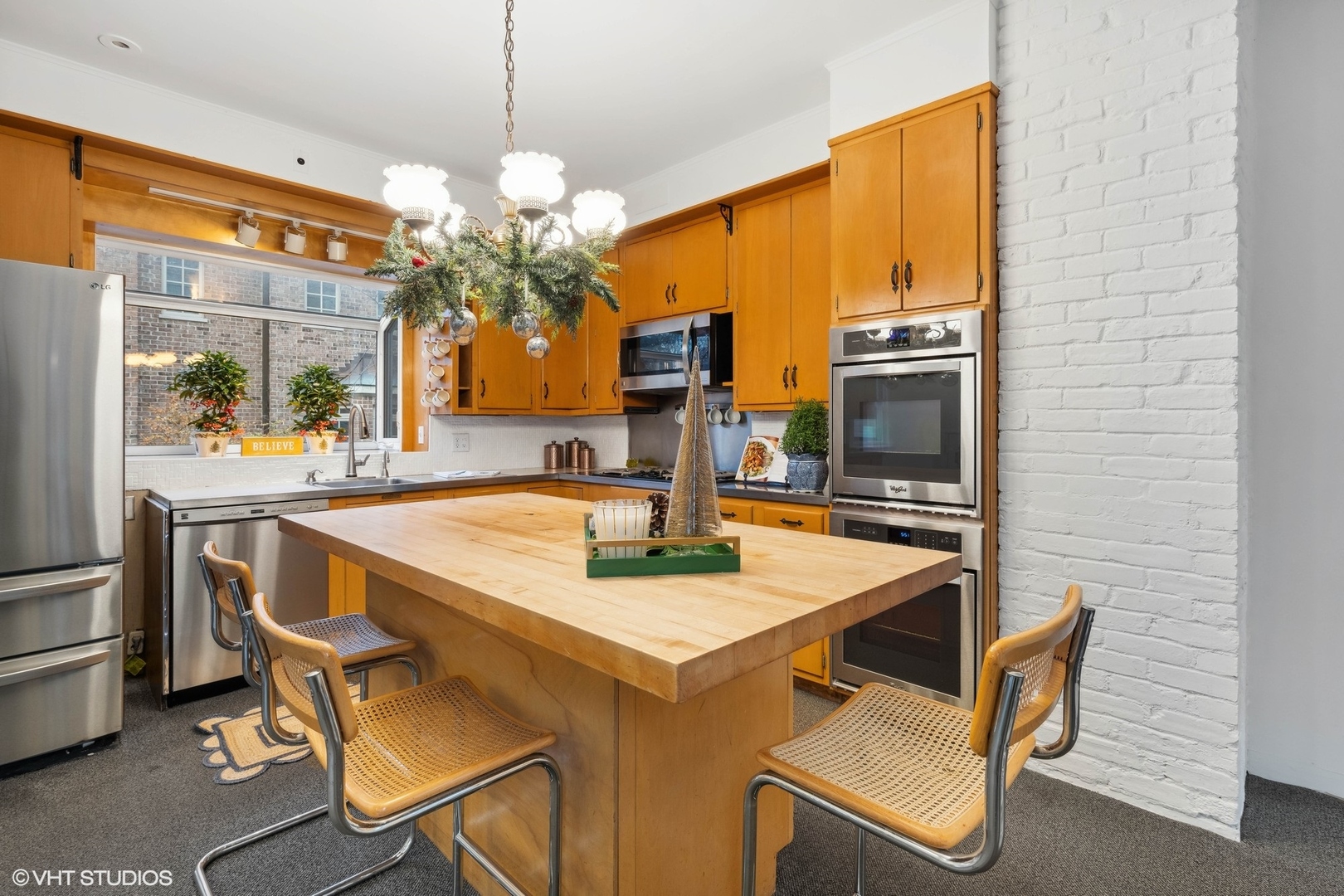 326 Ridge Avenue Winnetka, IL 60093 - Photo 13 of 36 a view of a dining room with furniture and a chandelier
