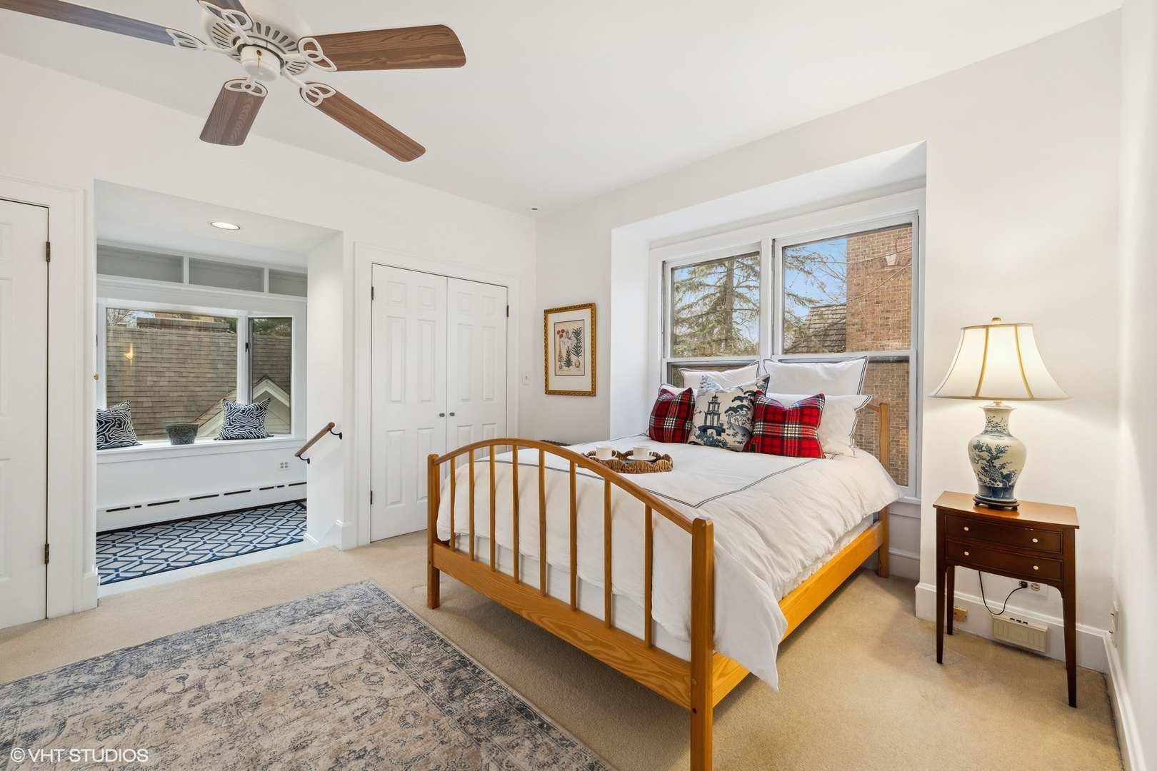 326 Ridge Avenue Winnetka, IL 60093 - Photo 15 of 36 a bedroom with a bed and a chandelier