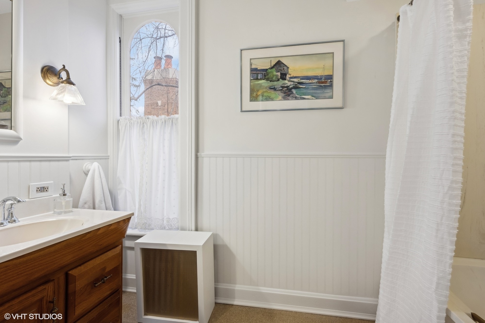 326 Ridge Avenue Winnetka, IL 60093 - Photo 20 of 36 a bathroom with a sink and a mirror