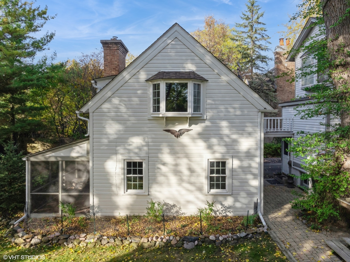 326 Ridge Avenue Winnetka, IL 60093 - Photo 23 of 36 a front view of a house with plants