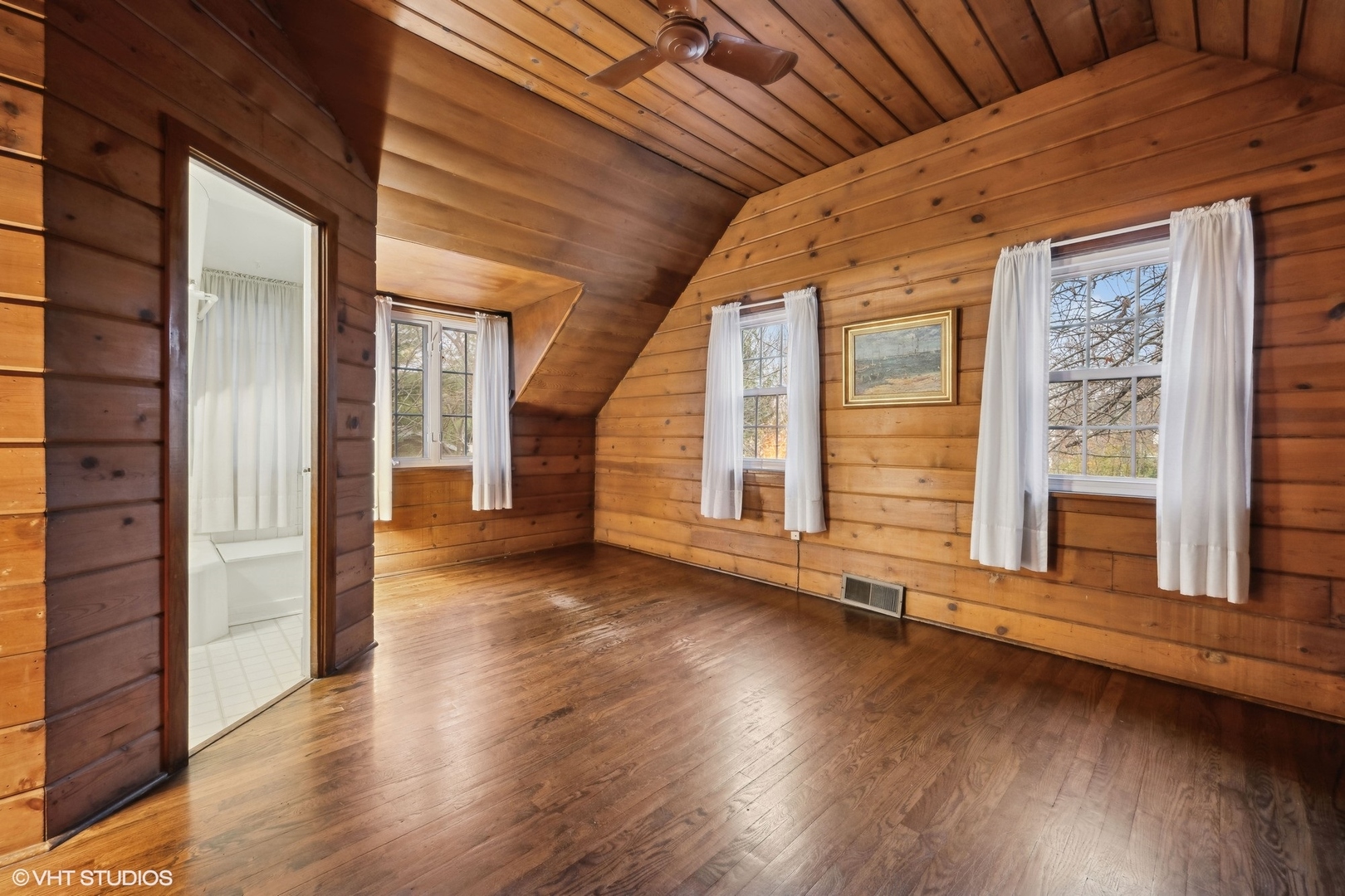 326 Ridge Avenue Winnetka, IL 60093 - Photo 28 of 36 an empty room with wooden floor and windows