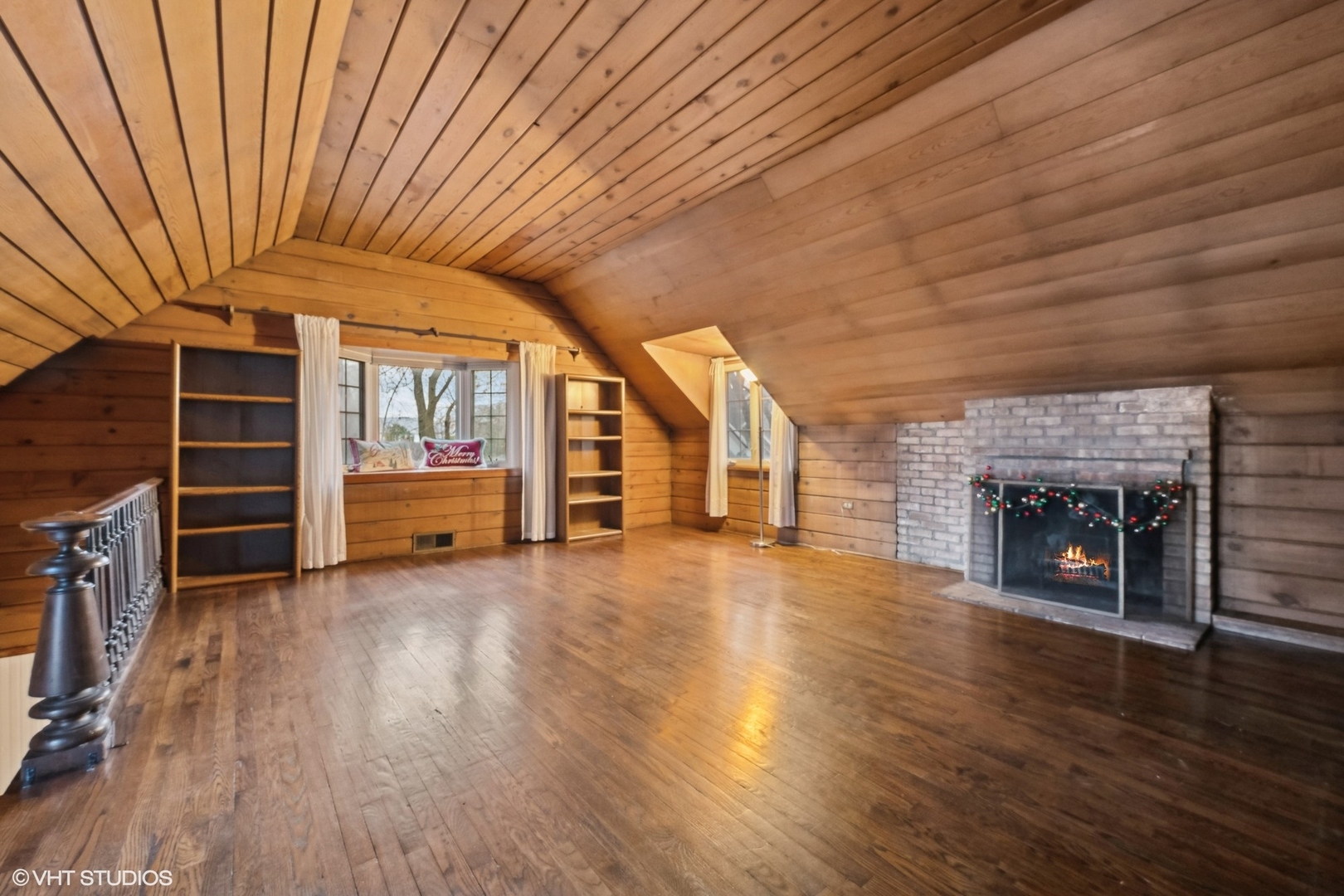 326 Ridge Avenue Winnetka, IL 60093 - Photo 30 of 36 an empty room with wooden floor fireplace and windows