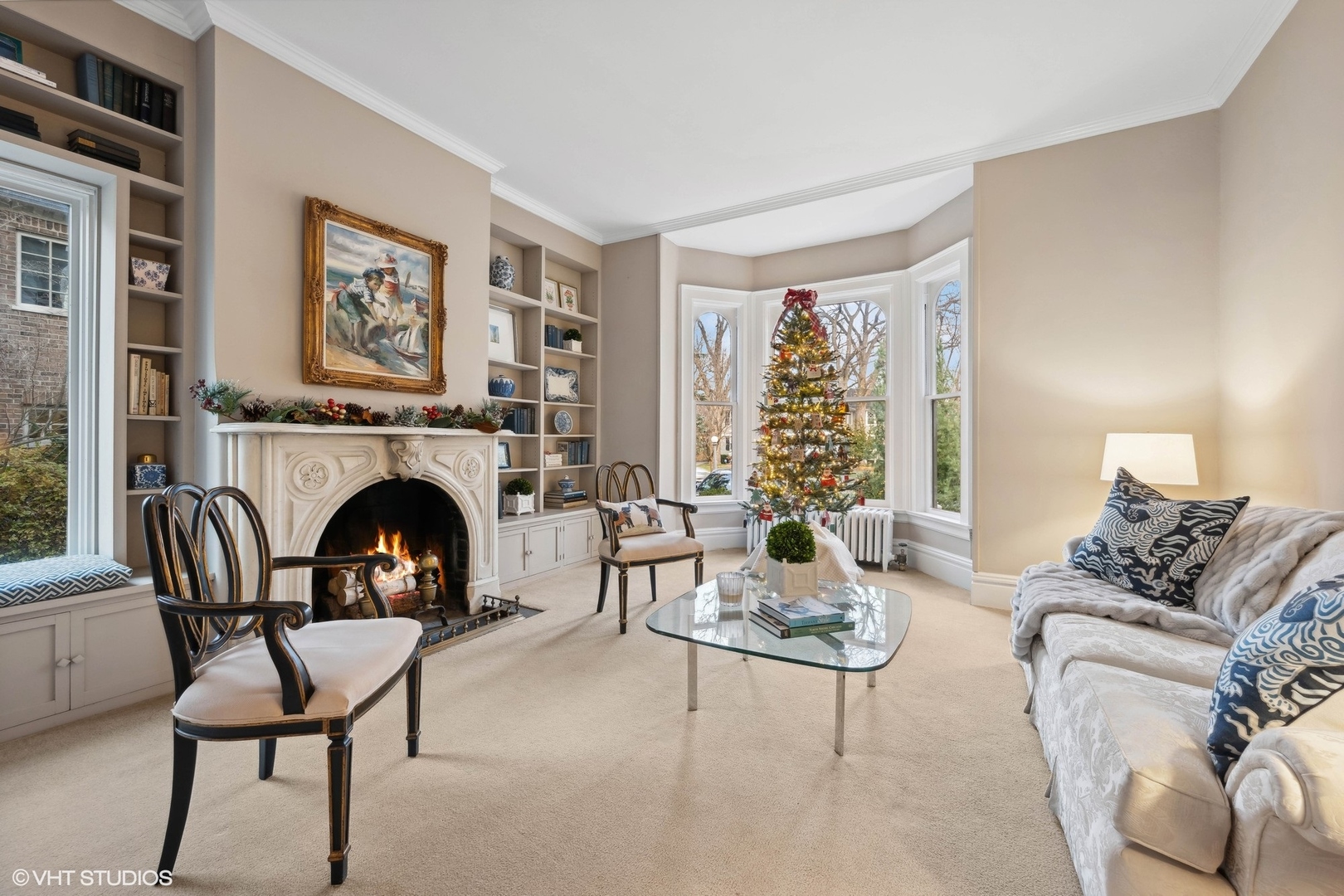 326 Ridge Avenue Winnetka, IL 60093 - Photo 6 of 36 a living room with furniture and a fireplace