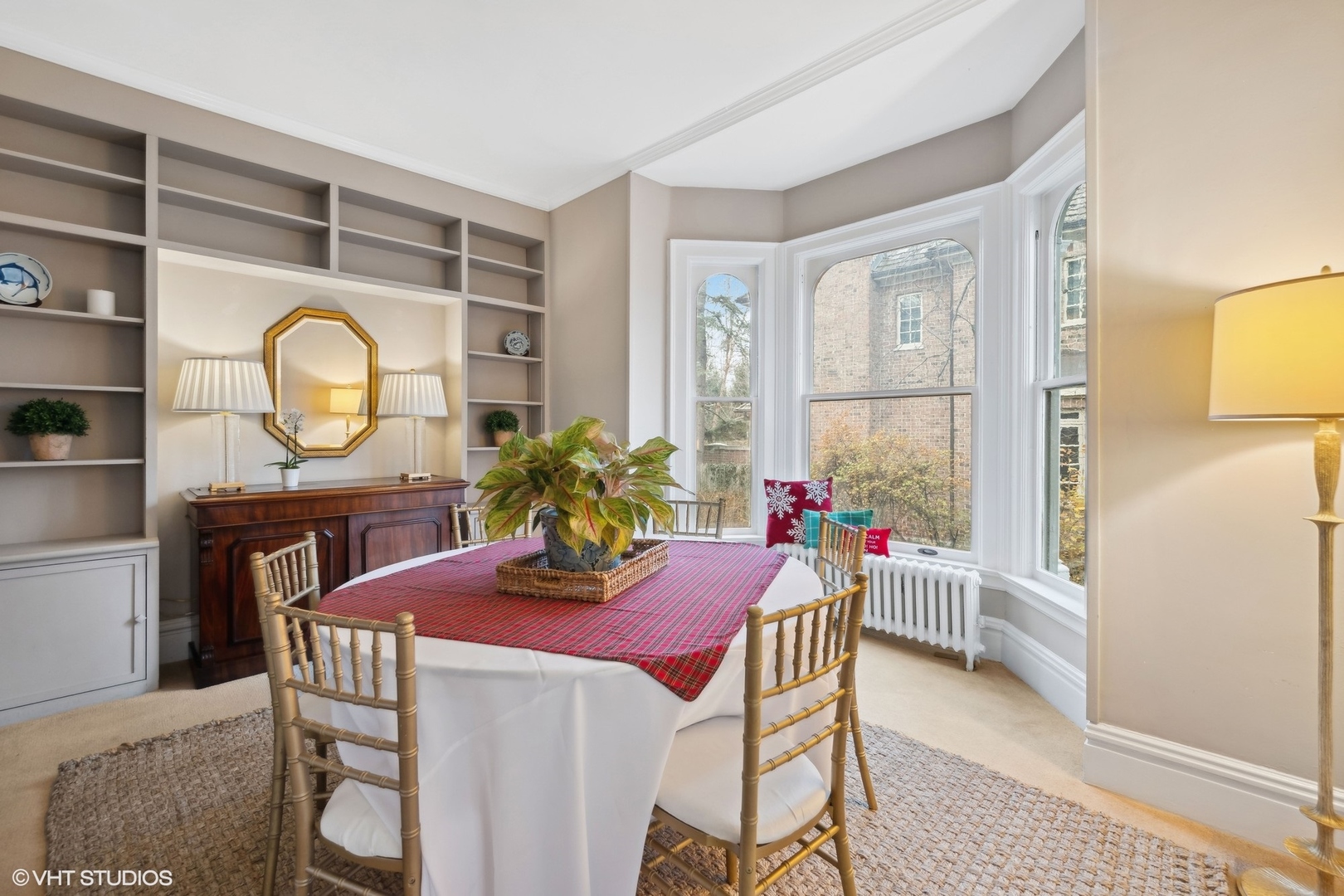326 Ridge Avenue Winnetka, IL 60093 - Photo 9 of 36 a view of a dining room with furniture and a window