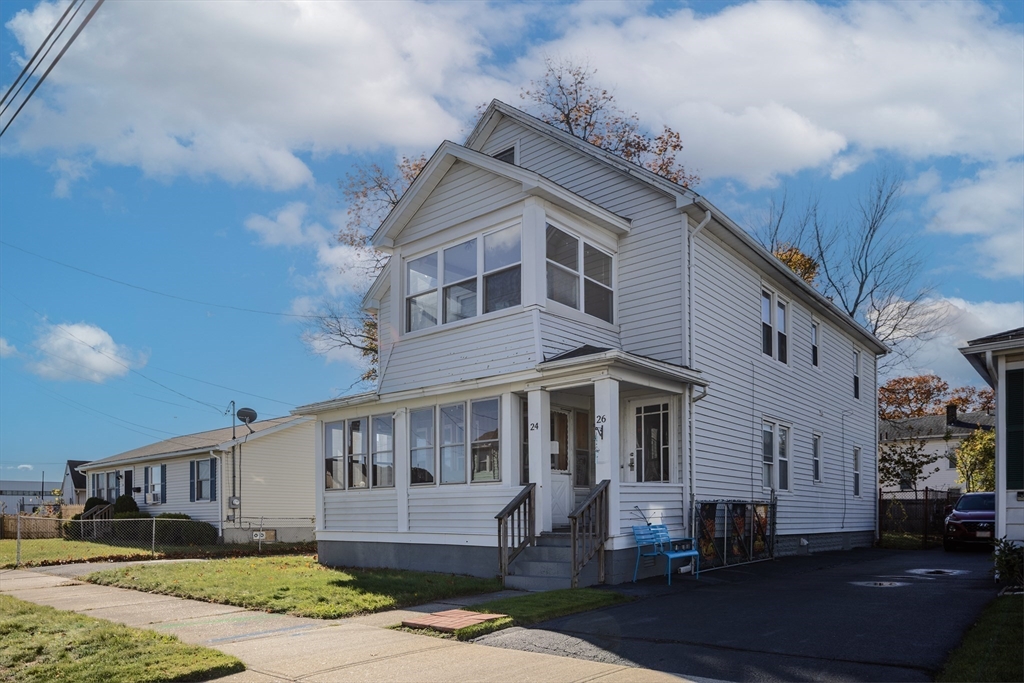 24-26 Jenness Street Springfield, MA 01104 - Photo 3 of 26 a front view of a house with a yard