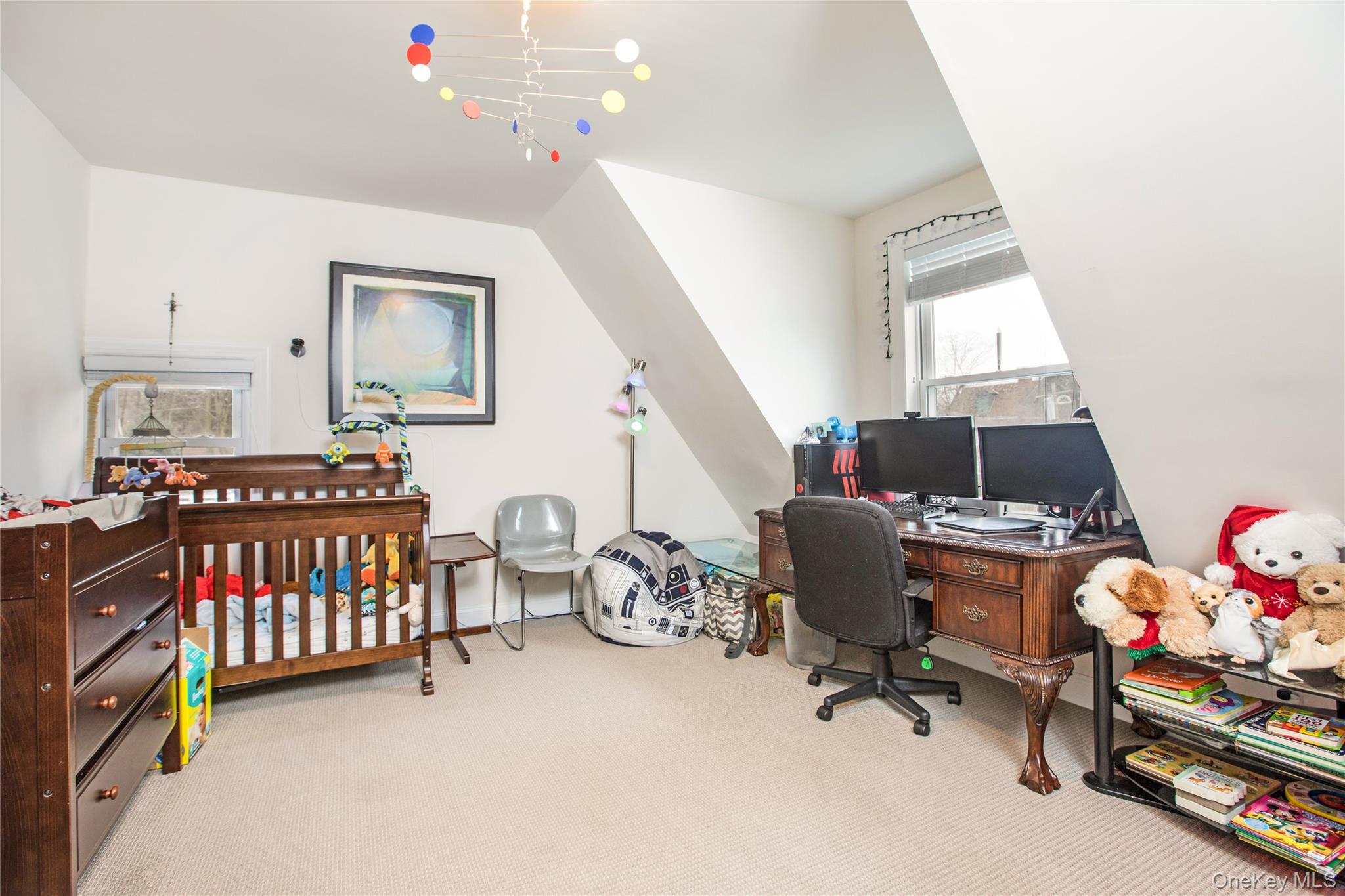 199 Purchase Street, Unit 2 Rye, NY 10580 - Photo 10 of 14 a bedroom with furniture and a window