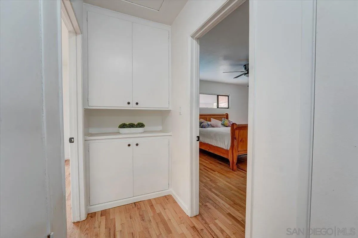 4561 Conrad Drive La Mesa, CA 91941 - Photo 24 of 59 a view of hallway with wooden floor
