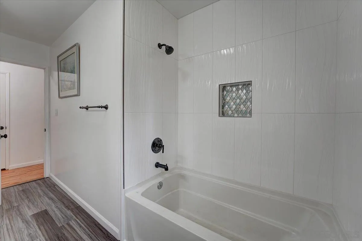 4561 Conrad Drive La Mesa, CA 91941 - Photo 28 of 59 a bathroom with a bathtub