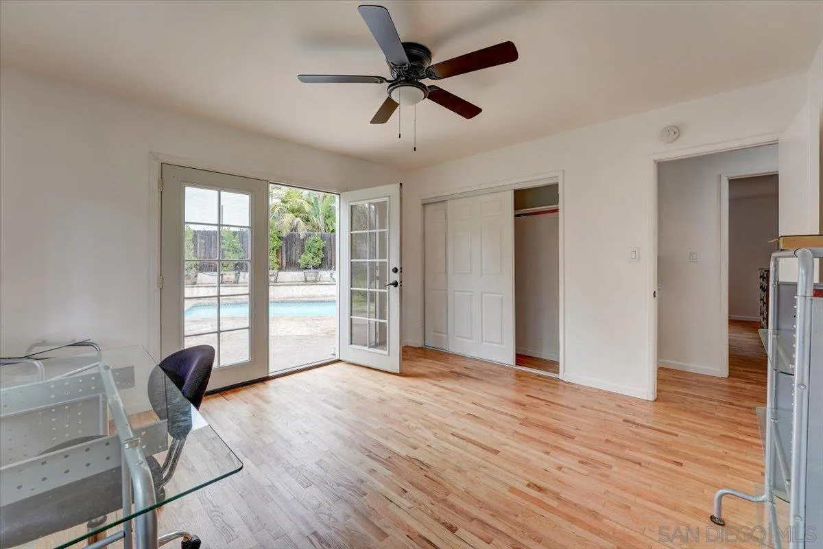 4561 Conrad Drive La Mesa, CA 91941 - Photo 29 of 59 a view of workspace with wooden floor and ceiling fan