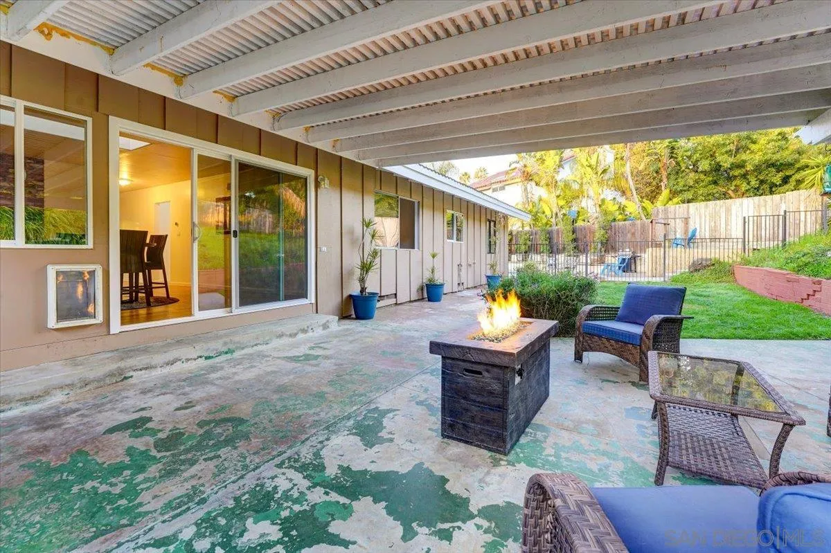 4561 Conrad Drive La Mesa, CA 91941 - Photo 48 of 59 a house view with a sitting space and garden in the back