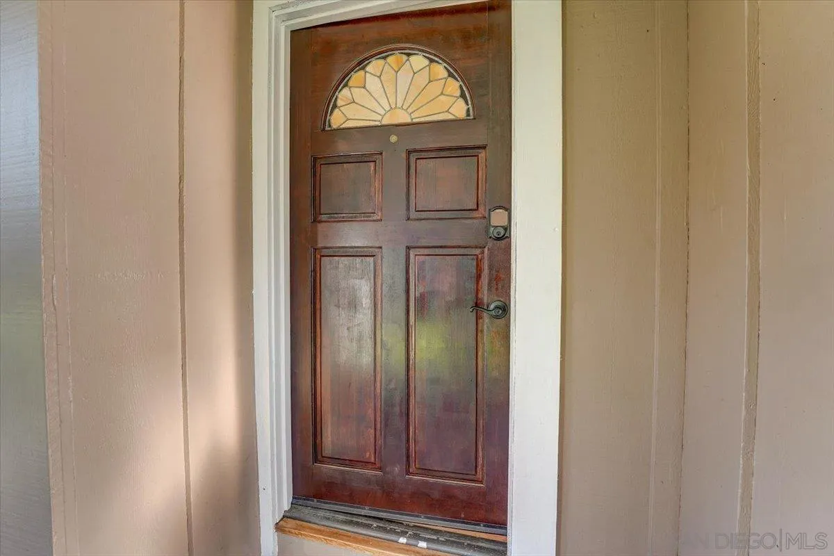 4561 Conrad Drive La Mesa, CA 91941 - Photo 8 of 59 a view of front door with a mirror