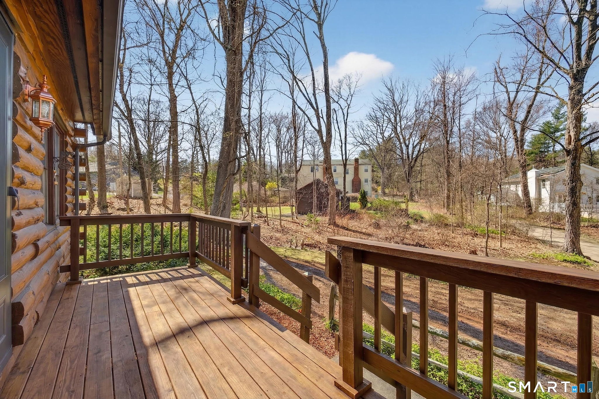 737 Shepard Avenue Hamden, CT 06514 - Photo 24 of 33 a view of a balcony with wooden floor and fence