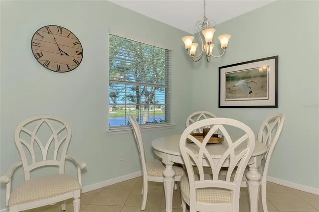 a kitchen with stainless steel appliances granite countertop a refrigerator sink and cabinets