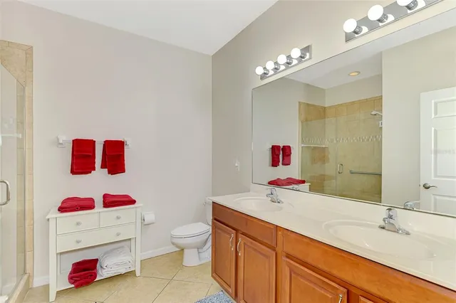 a bathroom with a sink and a shower
