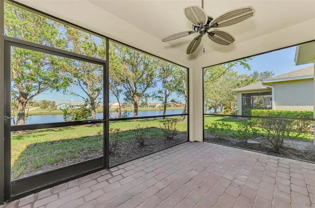wooden floor in a hall with a window
