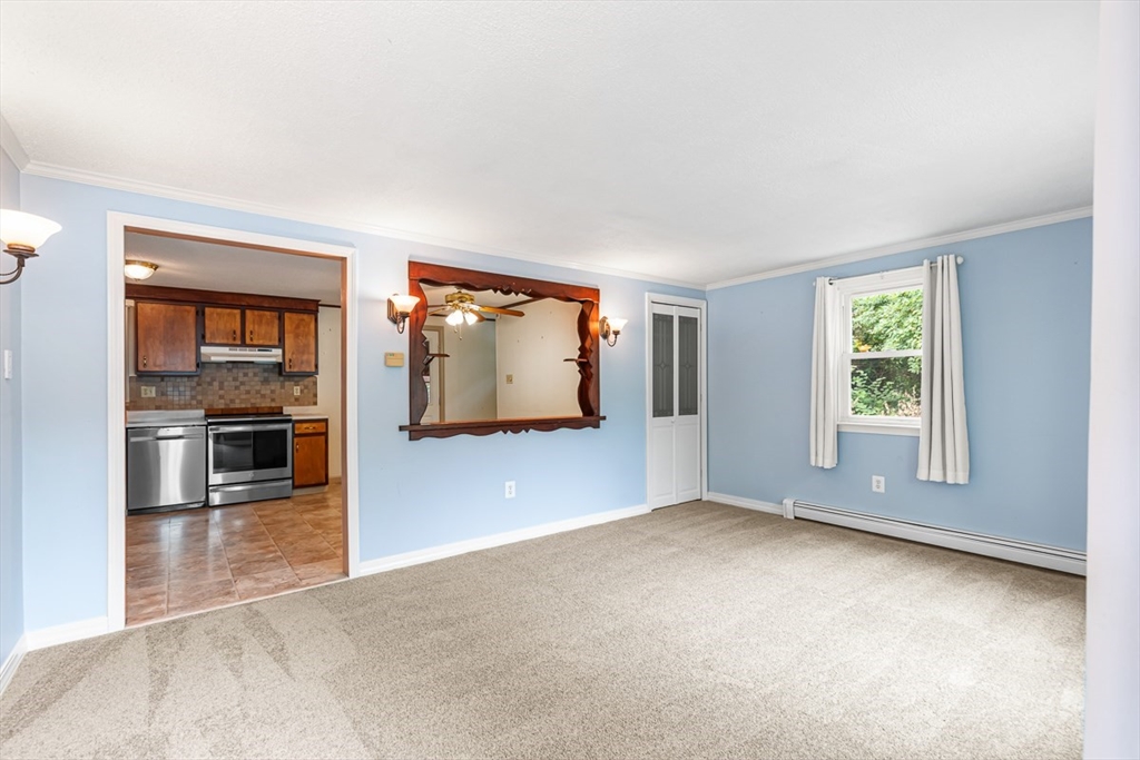 99 Swansom Road Swansea, MA 02777 - Photo 5 of 42 wooden floor in an empty room with a window