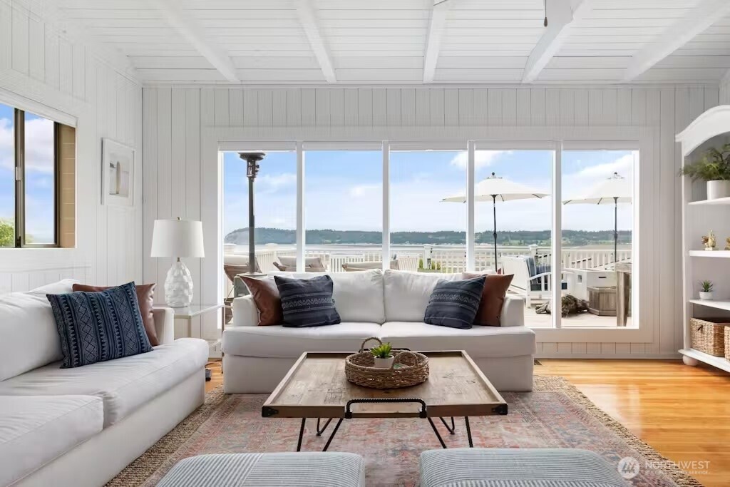 6192 Kohlwes Road Clinton, WA 98236 - Photo 8 of 12 a living room with furniture and a large window