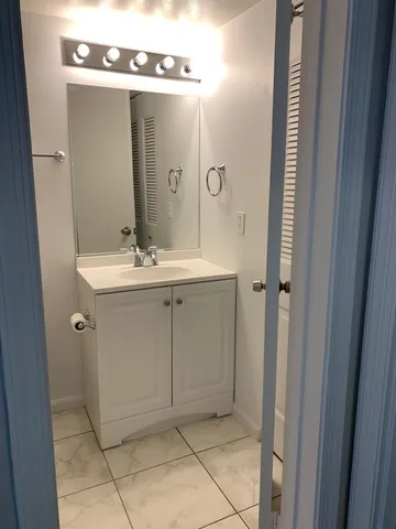 a view of a room with windows