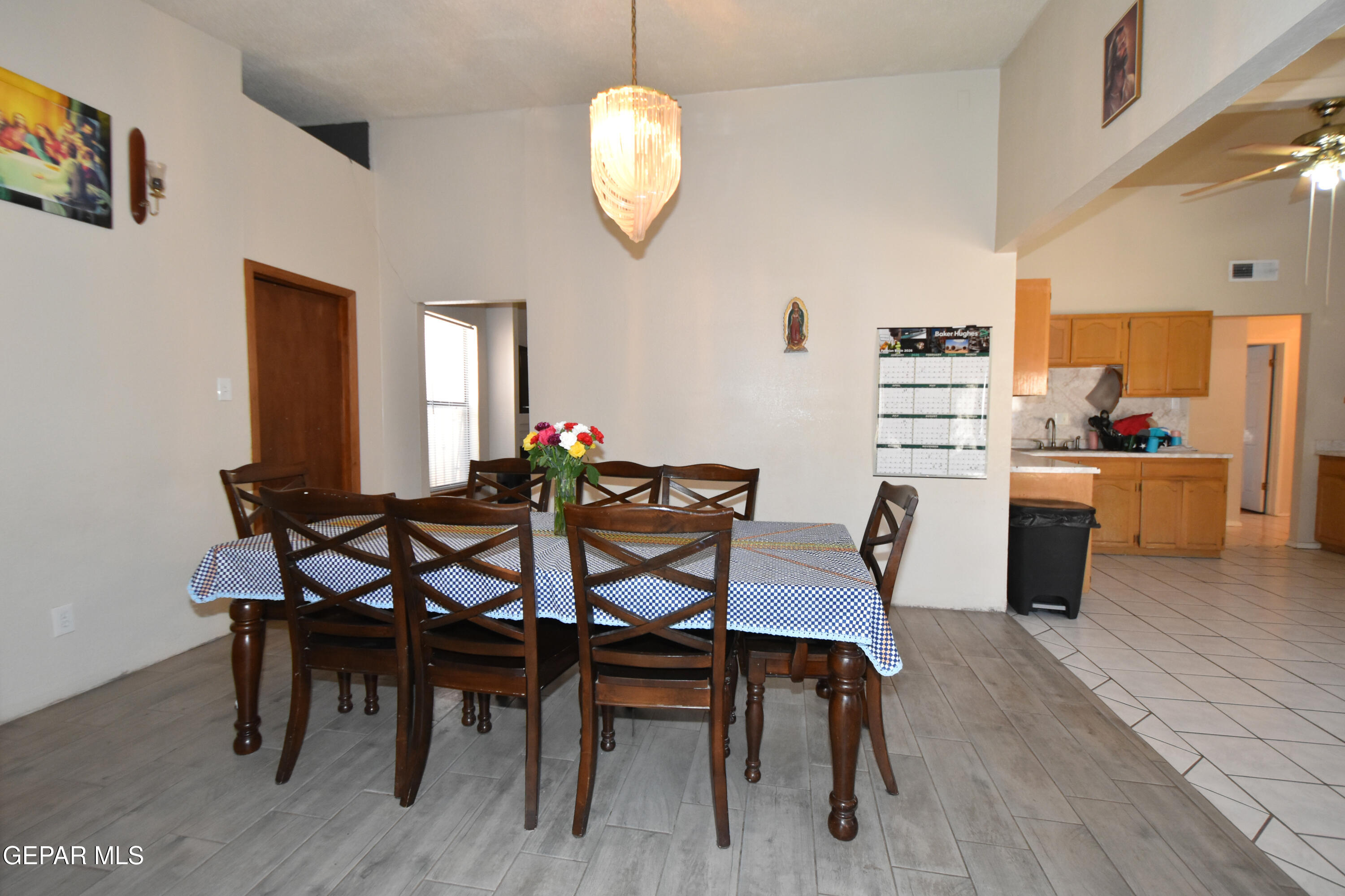 1623 Brian Ray Circle El Paso, TX 79936 - Photo 17 of 41 a view of a dining room with furniture and wooden floor