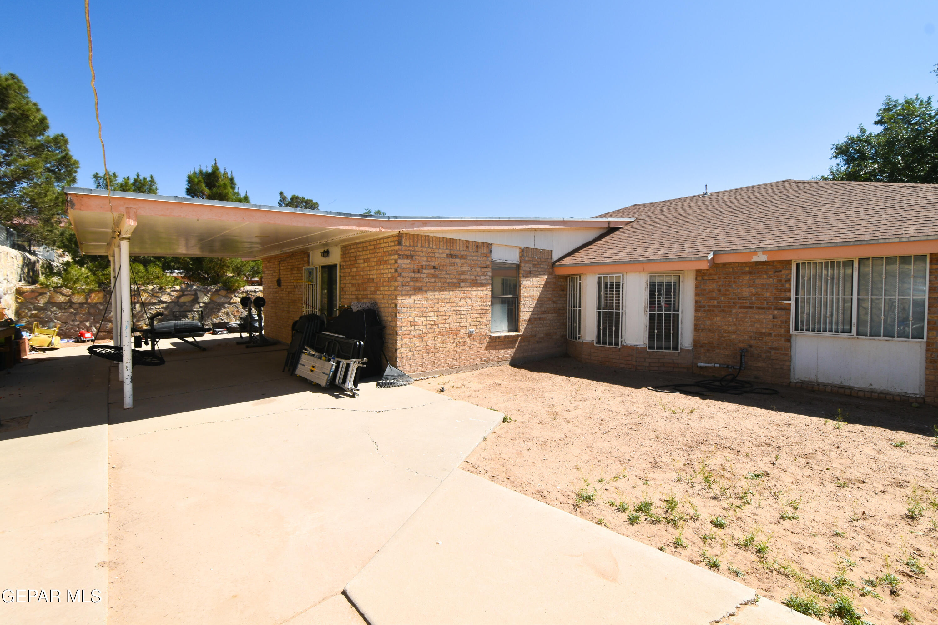 1623 Brian Ray Circle El Paso, TX 79936 - Photo 19 of 41 a view of a terrace with wooden fence