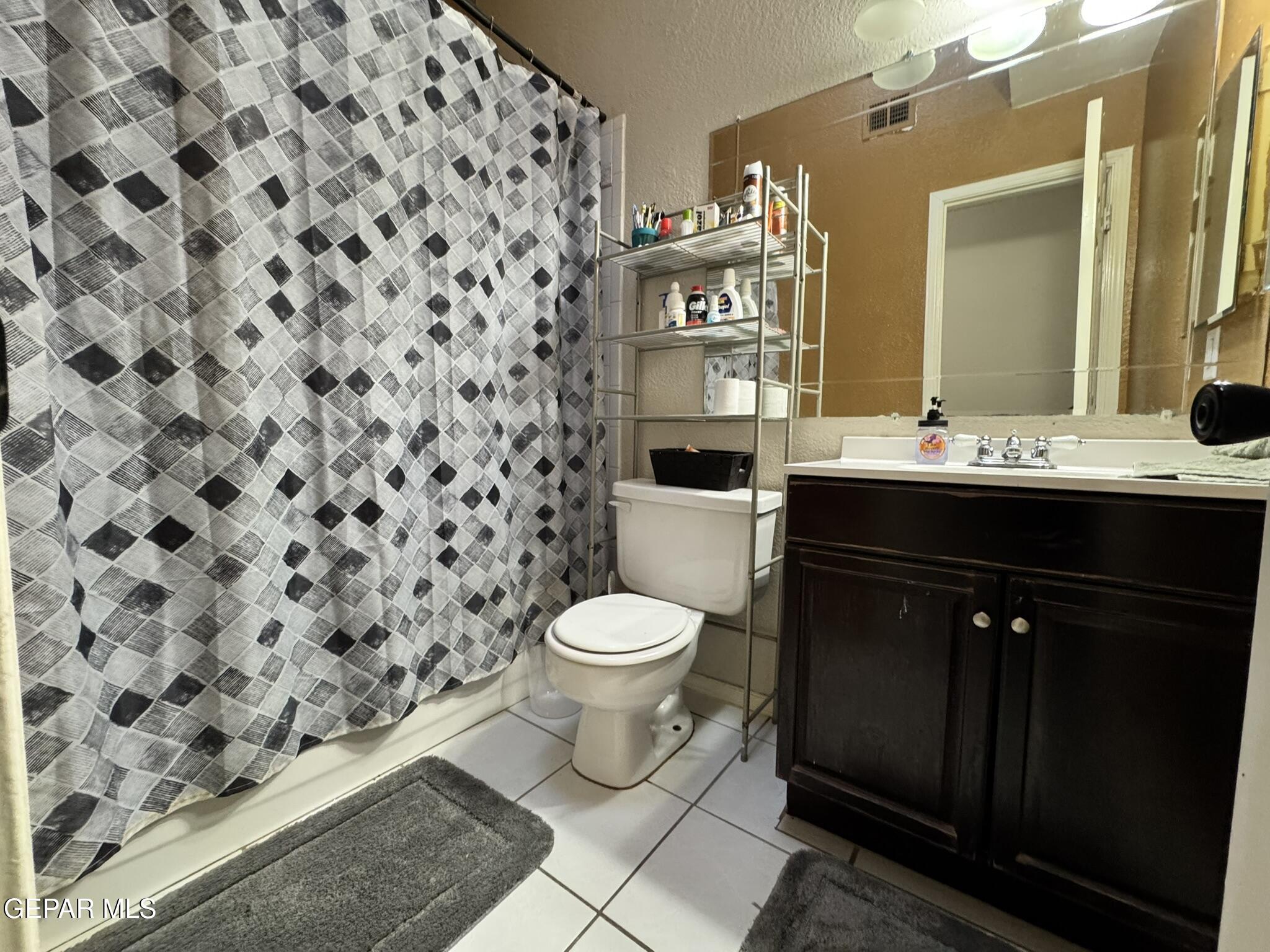 1623 Brian Ray Circle El Paso, TX 79936 - Photo 27 of 37 a bathroom with a sink and a toilet