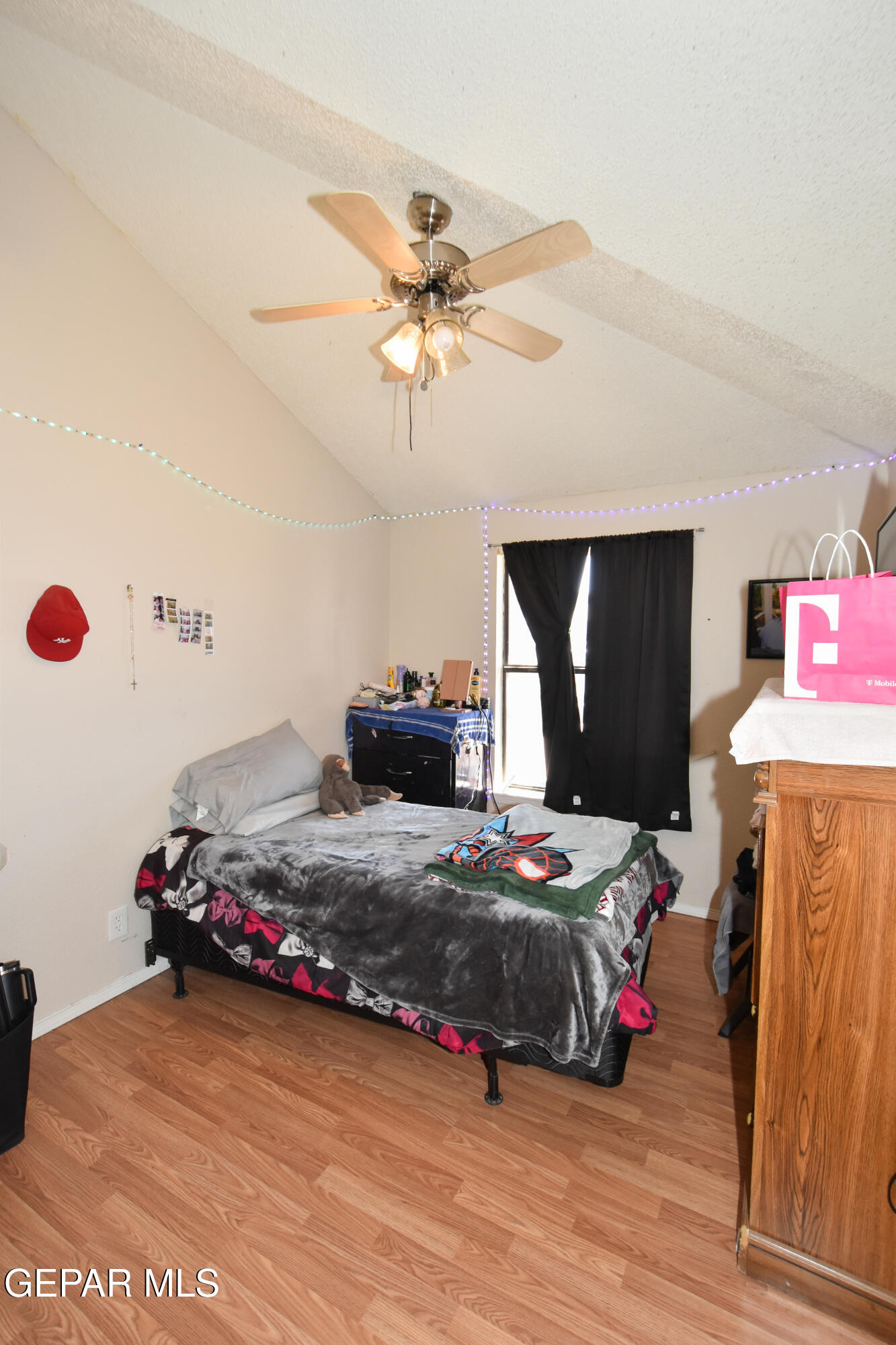 1623 Brian Ray Circle El Paso, TX 79936 - Photo 27 of 41 a bedroom with bed and a window