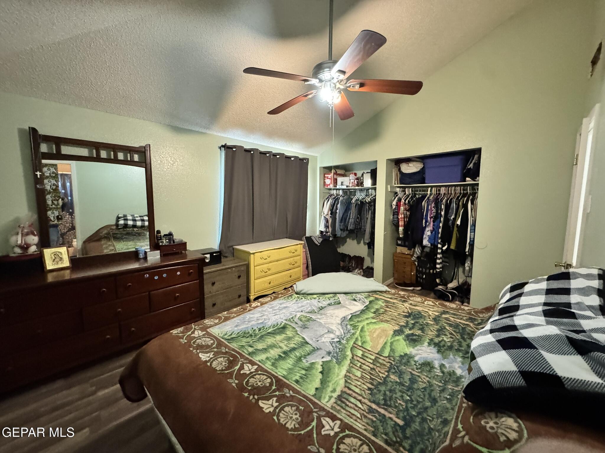 1623 Brian Ray Circle El Paso, TX 79936 - Photo 30 of 37 a bed room with a bed and a mirror