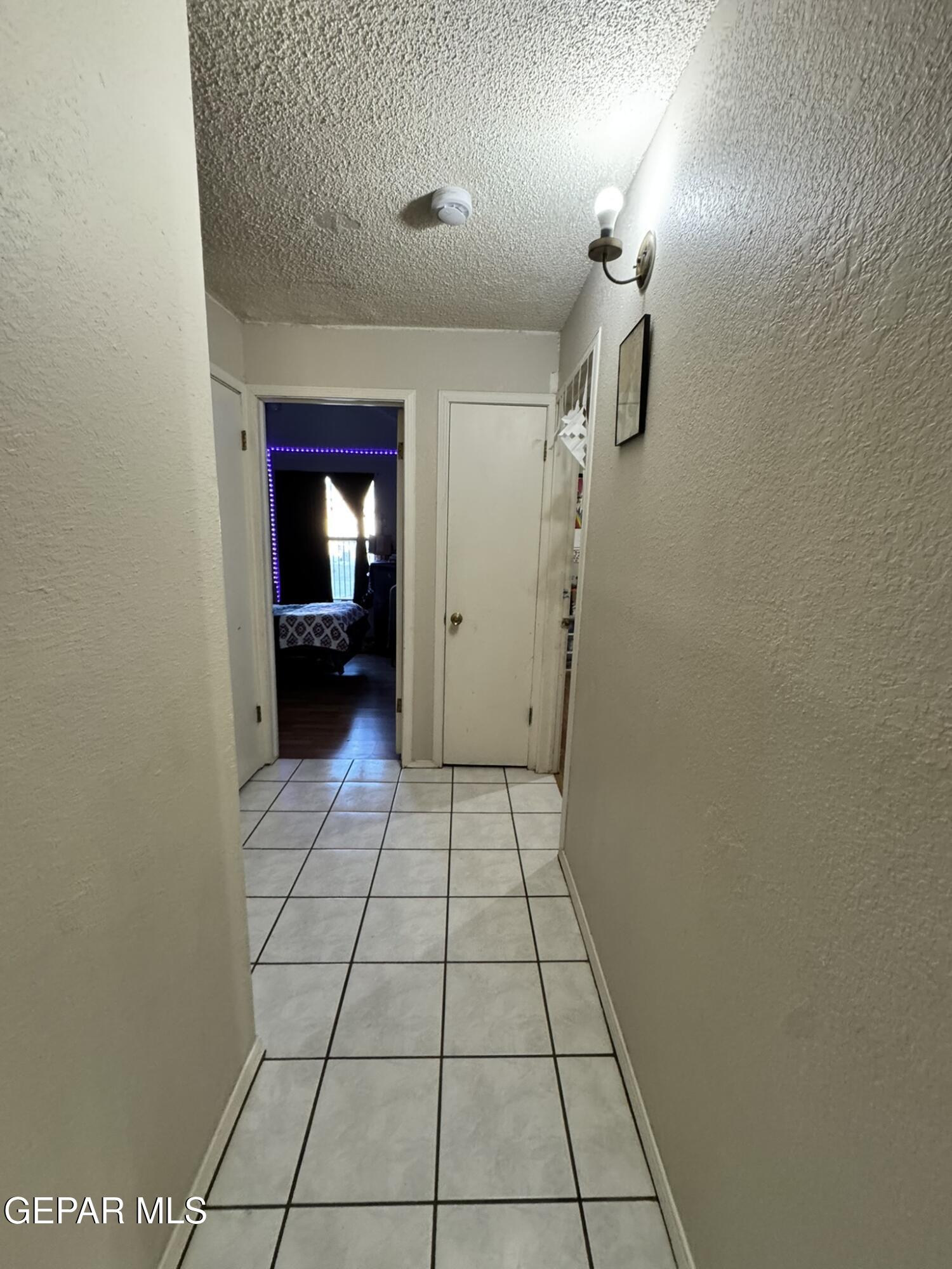 1623 Brian Ray Circle El Paso, TX 79936 - Photo 31 of 37 a view of an empty room and fire place