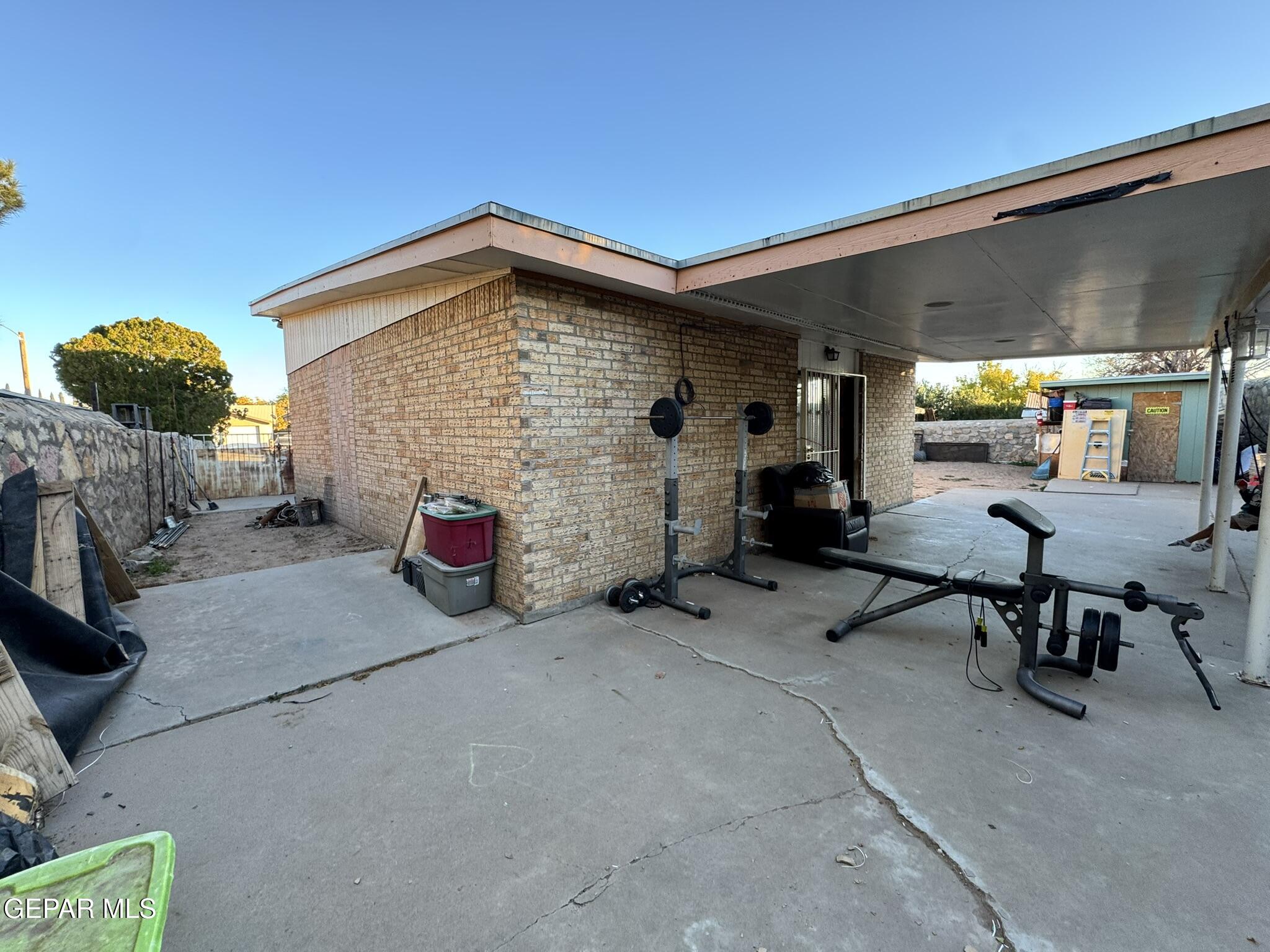 1623 Brian Ray Circle El Paso, TX 79936 - Photo 37 of 37 a view of a patio with a table and chairs and potted plants