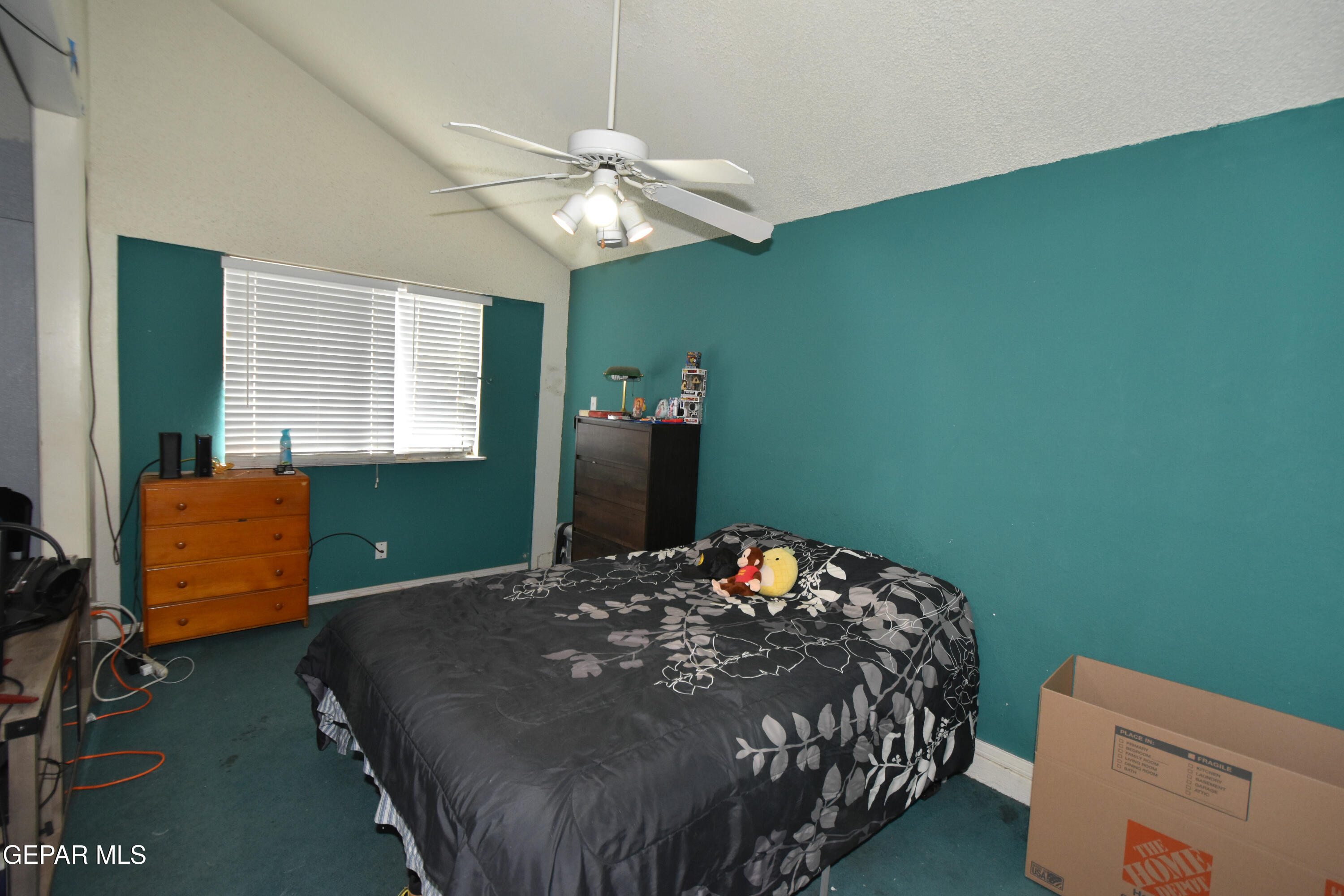 1623 Brian Ray Circle El Paso, TX 79936 - Photo 38 of 41 a bed sitting in a bedroom next to a window