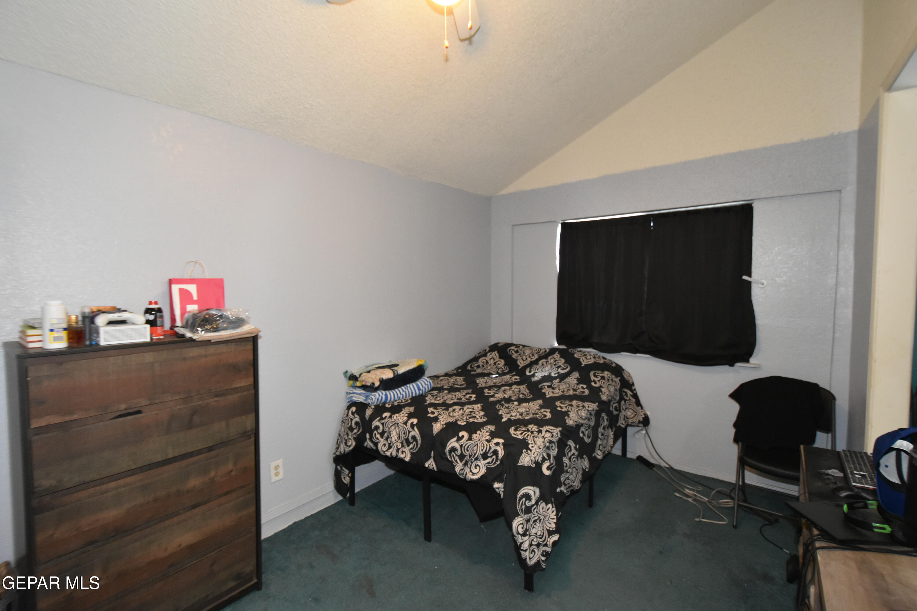 1623 Brian Ray Circle El Paso, TX 79936 - Photo 39 of 41 a bedroom with a bed and a flat screen tv