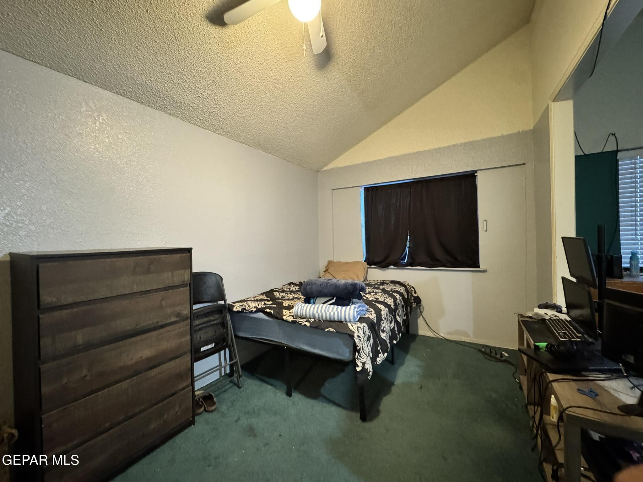 1623 Brian Ray Circle El Paso, TX 79936 - Photo 7 of 37 a bedroom with a bed and a flat screen tv