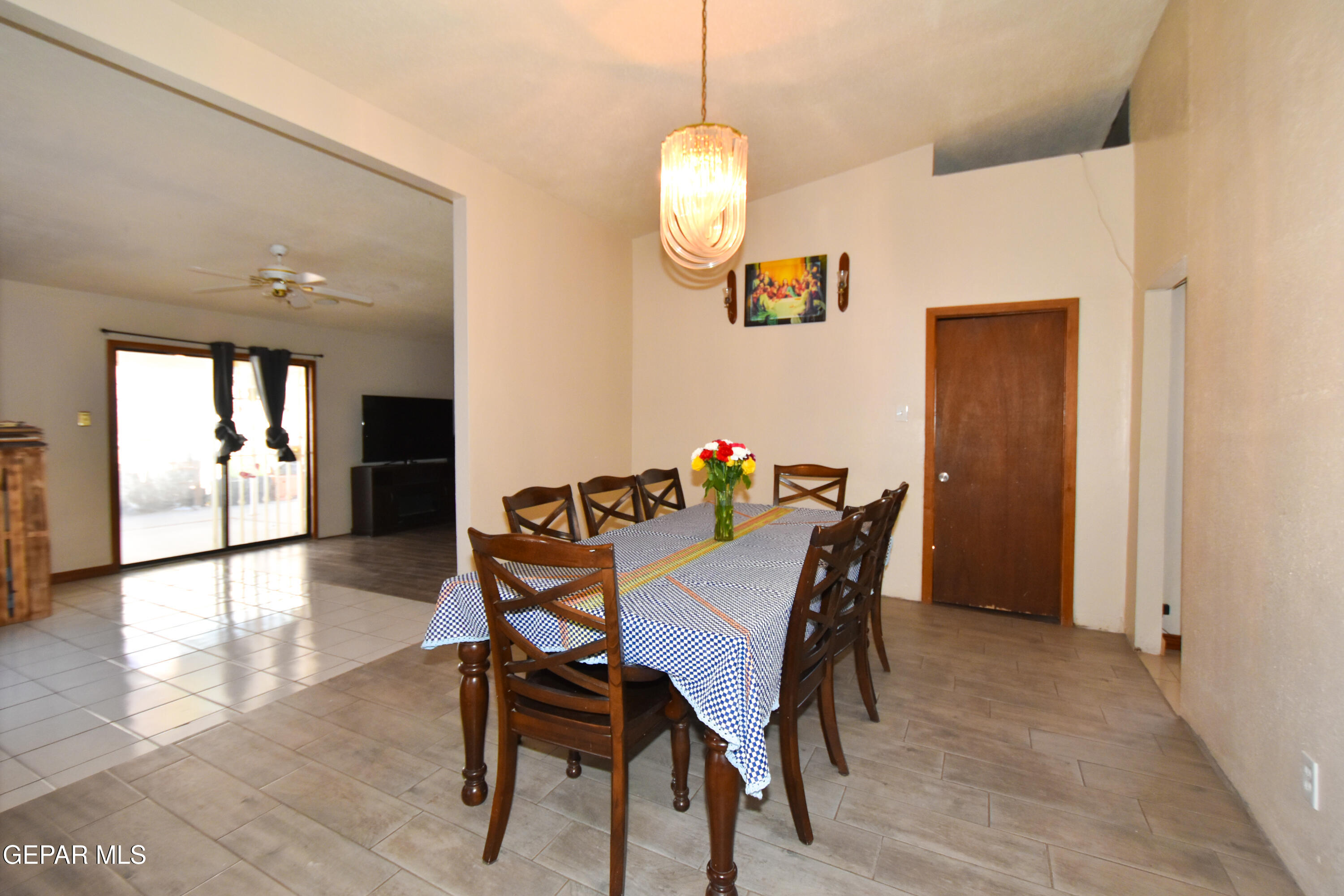 1623 Brian Ray Circle El Paso, TX 79936 - Photo 9 of 41 a view of a dining room with furniture and wooden floor