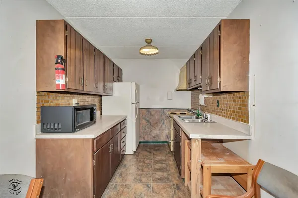 $130,000 | 1050 North Farnsworth Avenue, Unit 301, Aurora, IL 60505